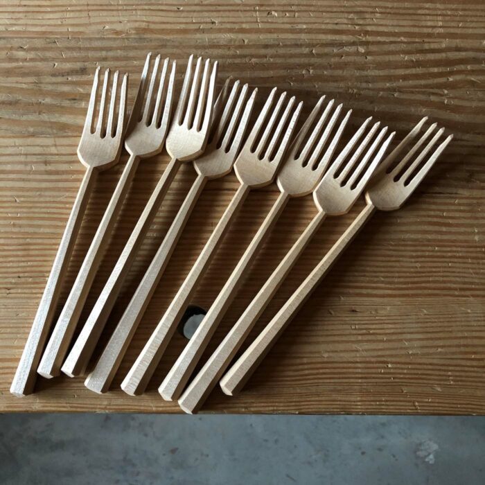 Hand-carved wood forks by Dawson Moore