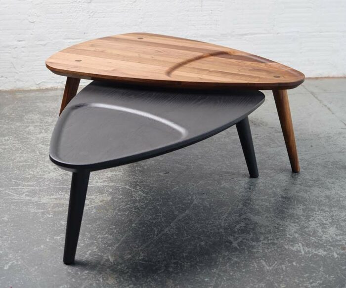 3 stacked triangle tables by Justin Nelson