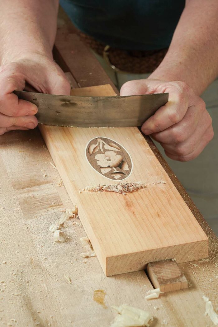 using a card scraper