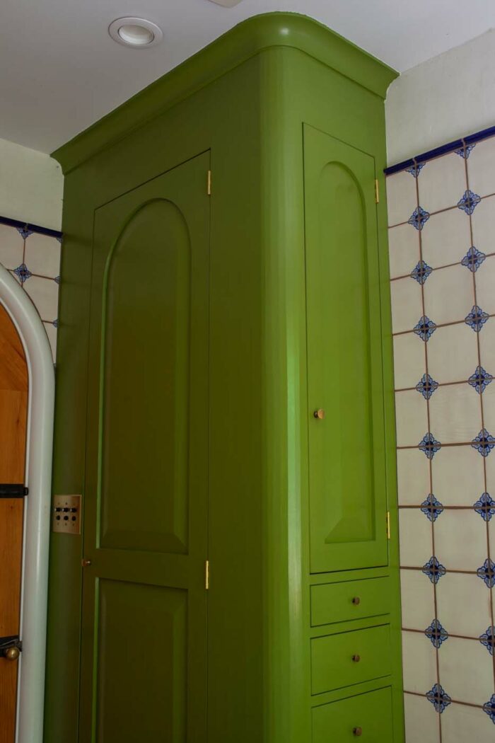 painted green wood cabinet by Brian Persico