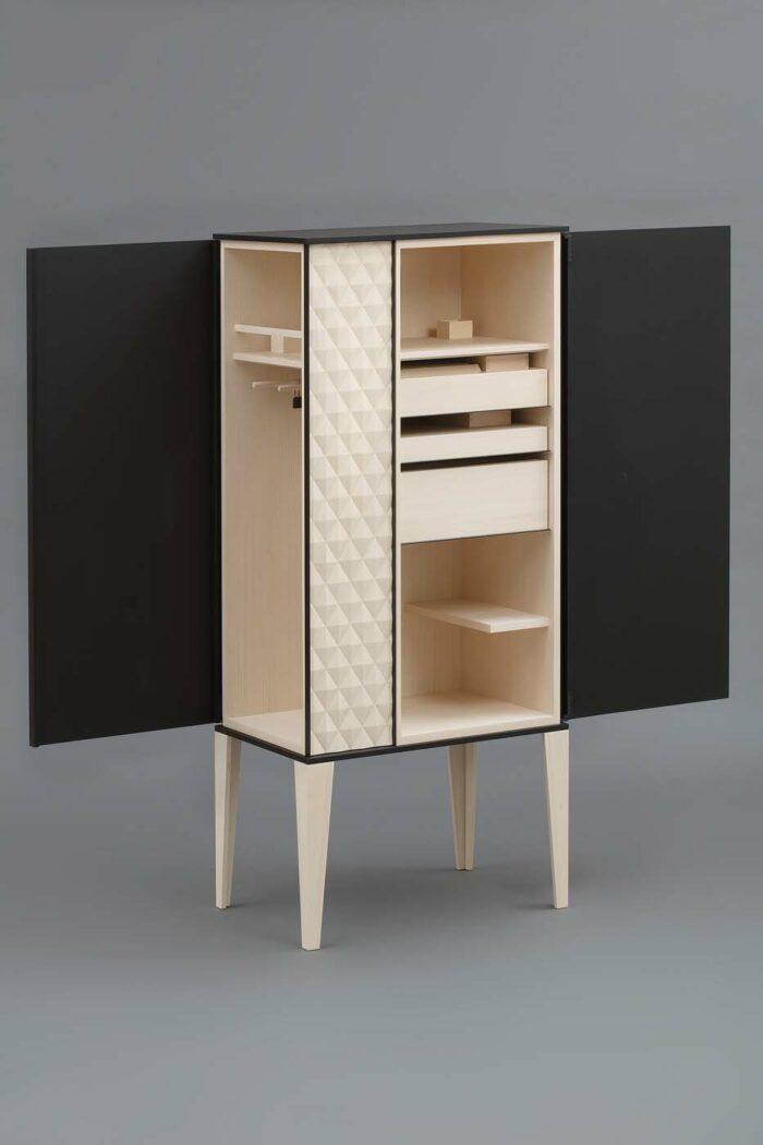 open white and black wood cabinet by Gunther Pfeffer