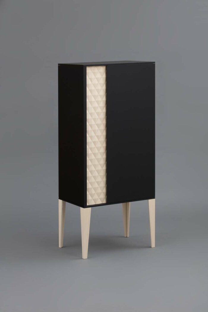 closed white and black cabinet by Gunther Pfeffer