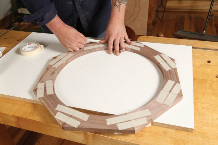 All eight pieces glued together and clamped with tape