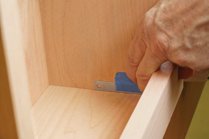 Leave a gap below the board for the knuckle of the hinge when it’s mounted in the setup block