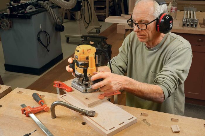 Start with the case. Remove the fence and use the pencil lines to align the template.