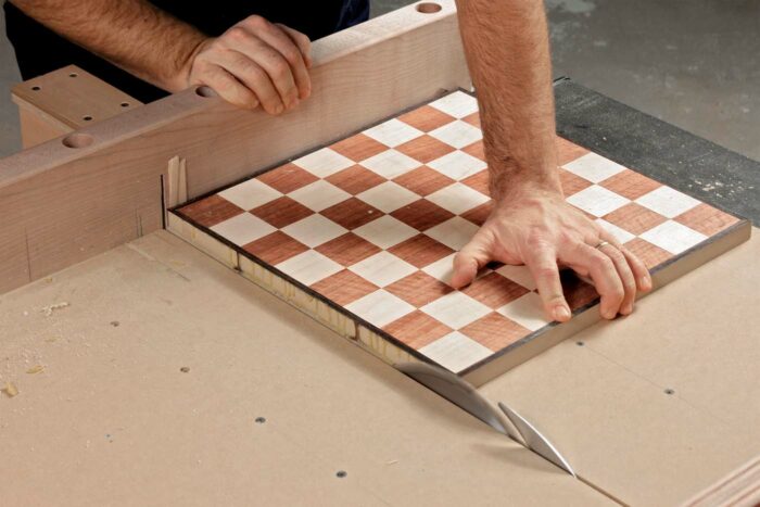 Cutting wooden chess board with table saw